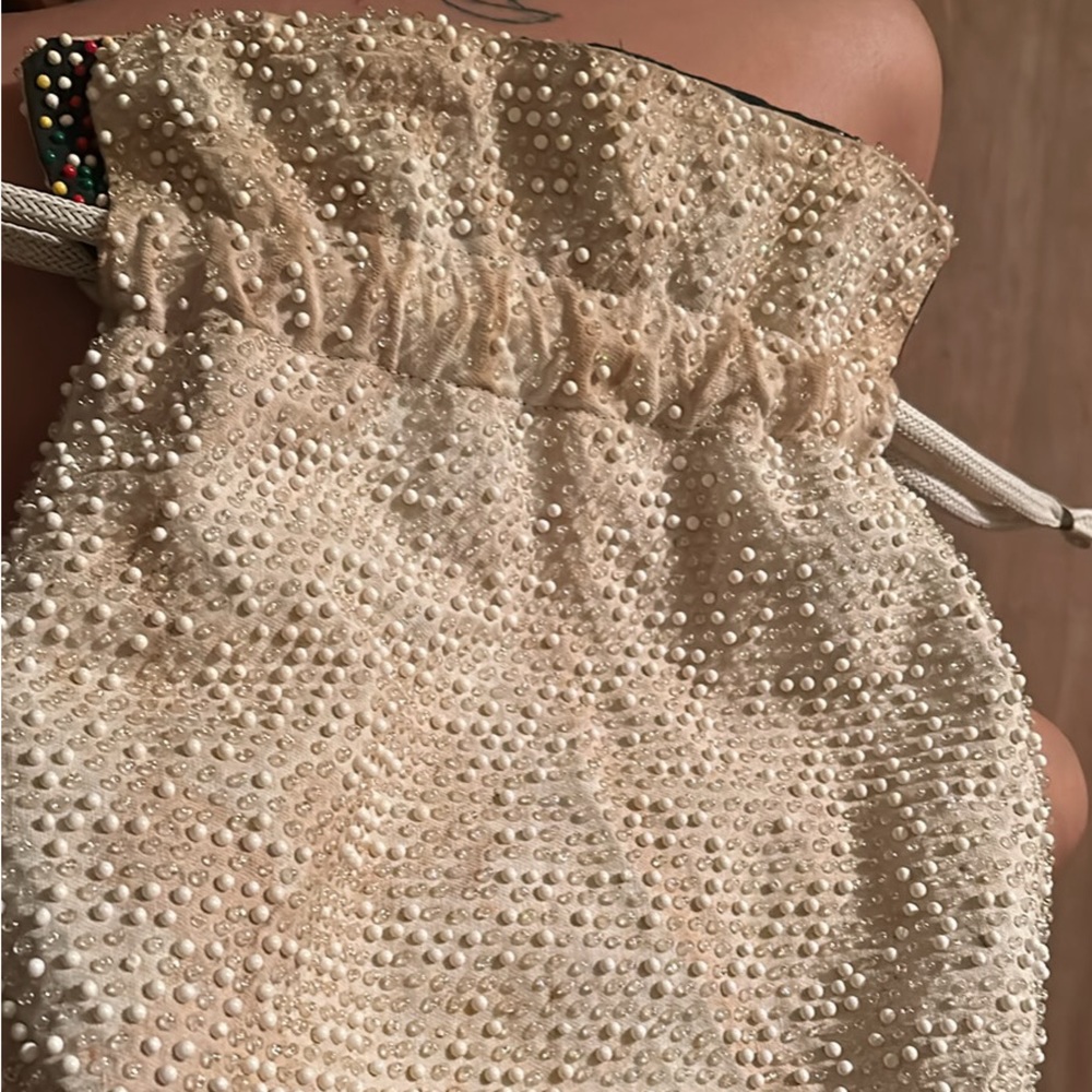 Reversible beaded drawstring handbag